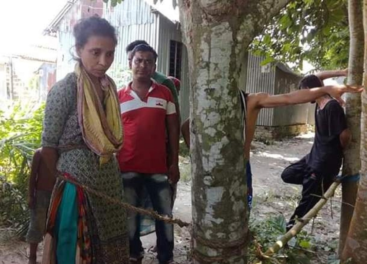 ছেলেধরা সন্দেহে নারীকে গাছের সাথে বেঁধে নির্যাতন