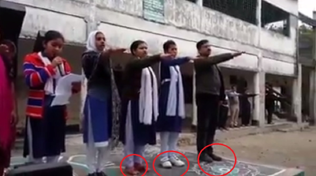 শহীদ মিনারে জুতা পায়ে শিক্ষক ও শিক্ষার্থীদের শপথ বাক্য পাঠ!