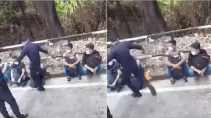 মালয়েশিয়ায় বিদেশি কর্মীকে পুলিশের লাথি মালয়েশিয়ায় বিদেশি কর্মীকে পুলিশের লাথি