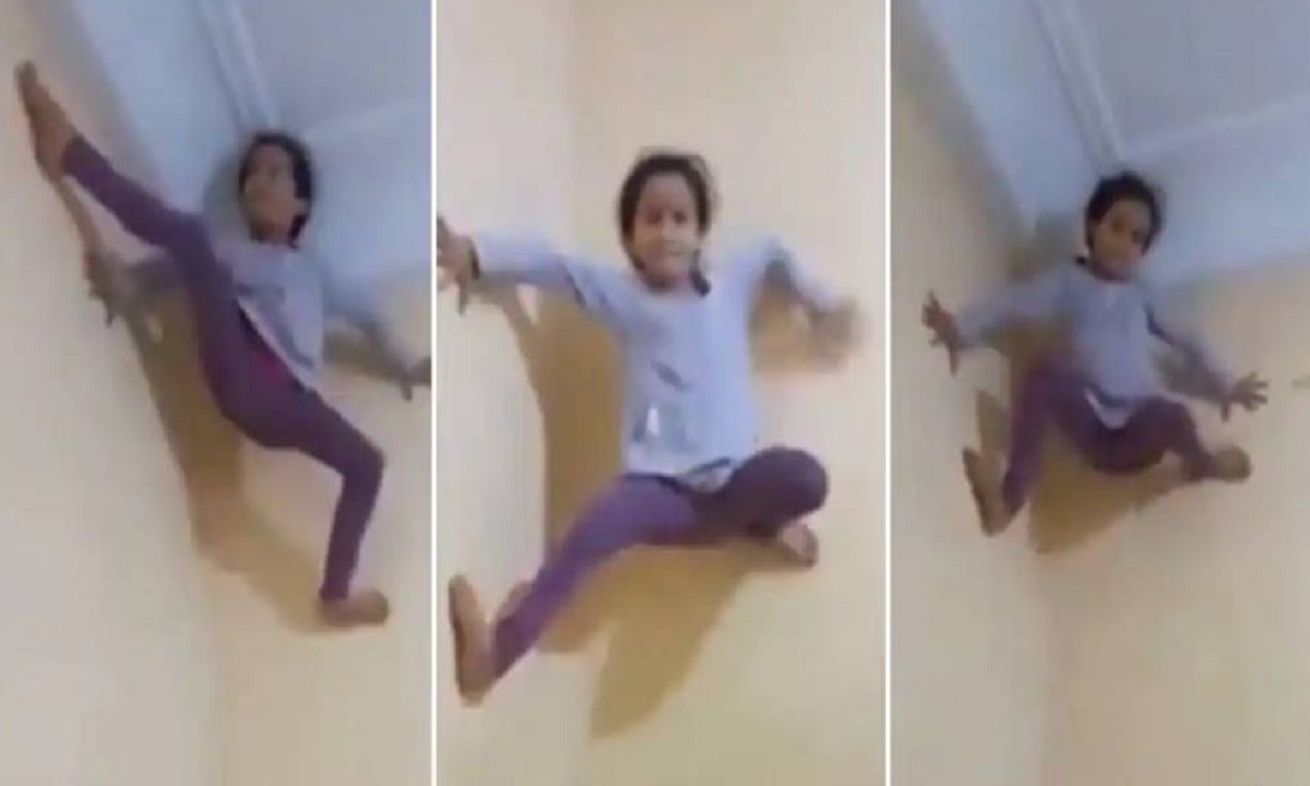 যেন স্পাইডারম্যান! পিছন ফিরে দেওয়াল বেয়ে উঠছে বালিকা (ভিডিও)