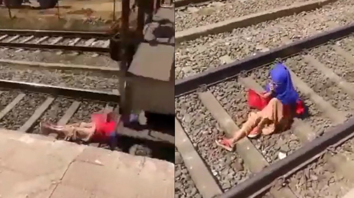 মাথার ওপর দিয়ে ট্রেন গেলেও নির্বিকারে উঠে আসলেন তরুণী (ভিডিও)