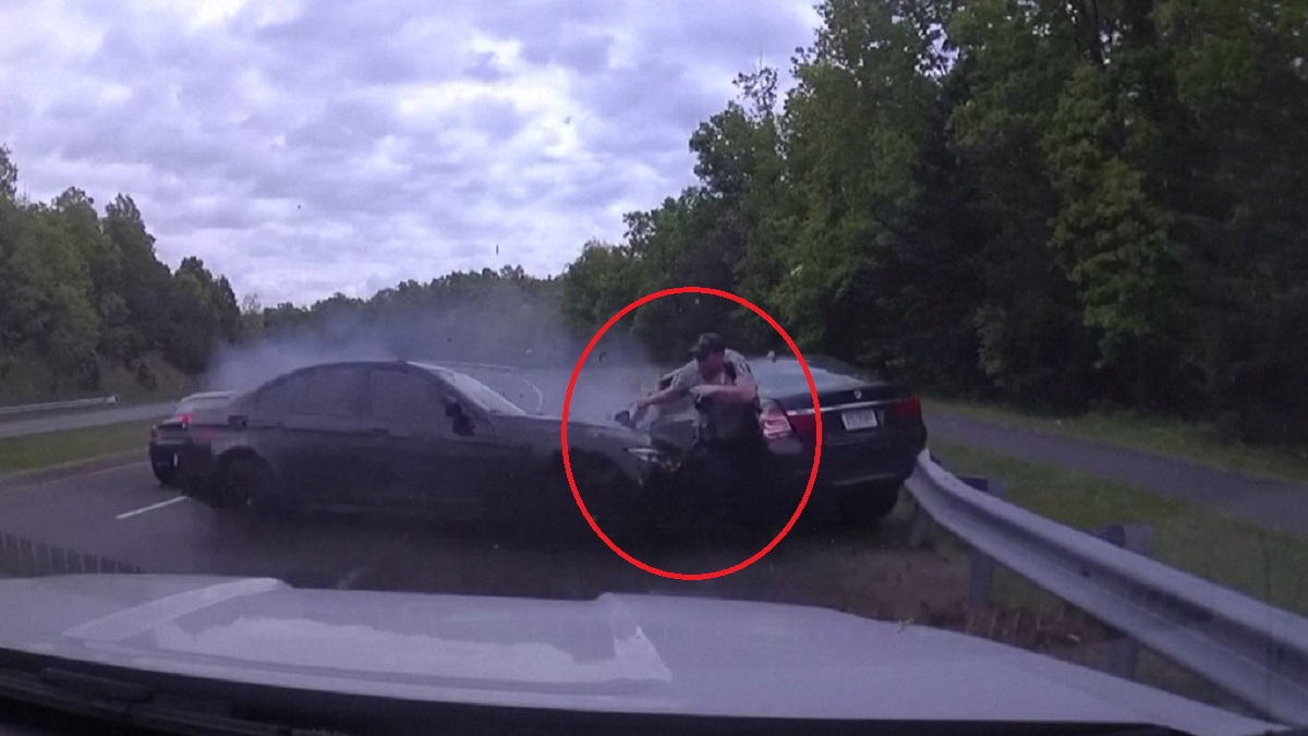 ভার্জিনিয়ায় অল্পের জন্য প্রাণে বাঁচলেন ট্র্যাফিক পুলিশ কর্মকর্তা