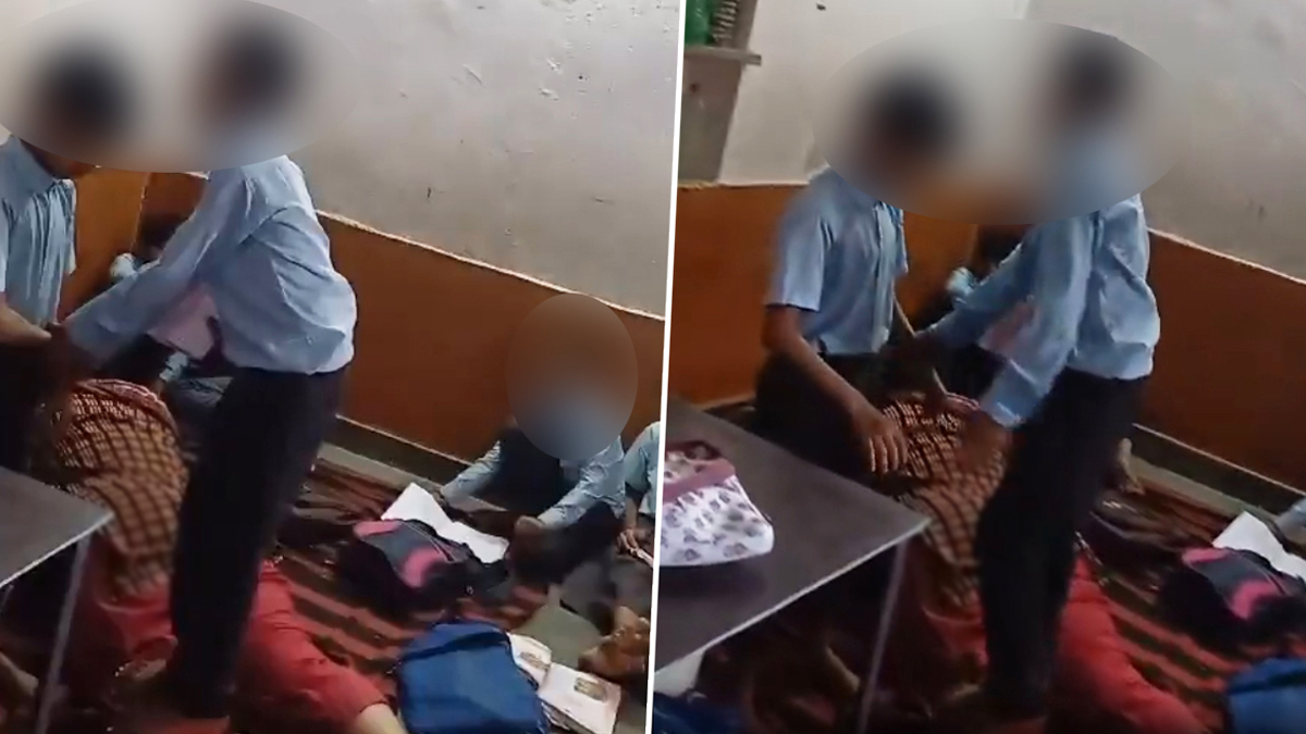 ভারতে স্কুলের মেঝেতে ঘুমাচ্ছেন শিক্ষিকা, পায়ে ম্যাসাজ করছে ছাত্ররা